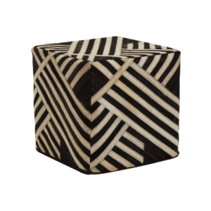 Abstract Cowhide Leather Pouf - Louis and Henry. a black leather cube pouf for contemporary interiors