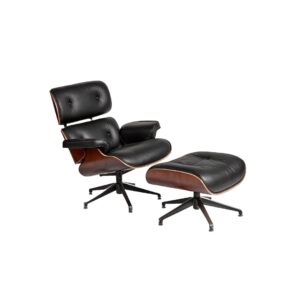 Leather and Walnut Lounge Chair with Footrest. a premium quality lounge chair. In the style of Eames, Vitra