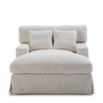 Cream snuggle chair with extended seating area, luxurious cream upholstery, dimensions 122x155x93cm