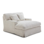 Cream snuggle chair with extended seating area, luxurious cream upholstery, dimensions 122x155x93cm