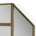 REGA octagonal gold-framed mirror with geometric divisions, showcasing mid-century modern design.