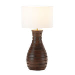 ICARUS Mango Wood Table Lamp, crafted from solid mango wood with a beautiful walnut finish and a unique channel design that sweeps to the top, adding elegance to any interior. Shop at Louis and Henry