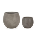 Set of two anthracite grey cement planters, one large and one small, with clean geometric lines. Shop now at Louis & Henry