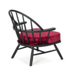 CYRUS Red and Black Armchair featuring a black wooden Windsor-style frame with a vibrant red velvet seat cushion