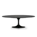 ETRO Black Marble Coffee Table with an oval black marble top, natural veining, and a black tulip base. Measures 120x60x42 cm.