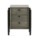 ITALO Grey Solid Wood Bedside Table with a sophisticated grey finish, black handles, and contemporary chunky legs that taper towards the bottom, ideal for enhancing bedroom style and functionality.