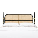 NERIAH Rattan and Cedar Wood Headboard with natural rattan, solid cedar wood frame in black, and golden bracket accents, ideal for enhancing bedroom decor.