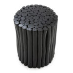 ORION Black Teak Wood Stool featuring bundled teak branches painted matte black in a cylindrical shape. Shop now at Louis & Henry