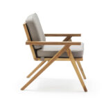 RAYMOND Grey Teak Wood Armchair featuring an angular teak frame with comfortable grey cushions, perfect for modern outdoor spaces.