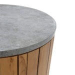 teak side table, natural stone furniture, sustainable design, indoor outdoor table, modern rustic decor, cylindrical table, mixed material furniture, contemporary side table, eco-friendly furniture, textured surface table