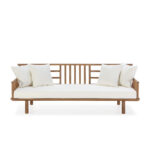 ELYEL modern teak outdoor sofa with white cushions on a clean background