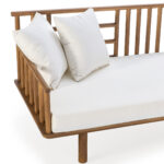 ELYEL modern teak outdoor sofa with white cushions on a clean background