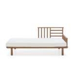 outdoor daybed, teak lounge furniture, sustainable patio daybed, modern garden bed, weather-resistant outdoor furniture, poolside lounger, versatile exterior seating. Shop at Louis & Henry. www.louisandhenry.co.uk