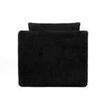 Plush black fabric armchair with a modern, boxy design