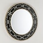 LAURENCE Black and White Mirror with a geometric pattern frame made from black and white glass pieces with a gold trim, ideal for adding contemporary elegance to living rooms, bedrooms, or entryways.