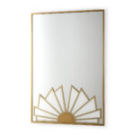 Rectangular gold-framed mirror with Art Deco sunburst design in lower right corner against white background