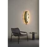 SALVATORE Golden Metal Wall Light with leaf-shaped design crafted from golden metal, ideal for modern interiors.