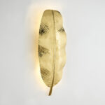 SALVATORE Golden Metal Wall Light with leaf-shaped design crafted from golden metal, ideal for modern interiors.