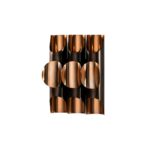 PIETRO Copper Wall Light with sculptural design featuring three cylindrical tubes and intricate perforations, ideal for sophisticated interiors.