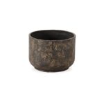 Small cylindrical planter in burnt black fibre cement with a textured, weathered surface