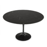 LORNE Black Marble Tulip Dining Table with a fiberglass base and a natural black marble top with white veining. Shop now at Louis & Henry