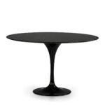 LORNE Black Marble Tulip Dining Table with a fiberglass base and a natural black marble top with white veining. www.louisandhenry.co.uk