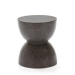 NETHERTON Black Terrazzo Stool with an hourglass shape and intricate terrazzo patterns on a sleek black surface.