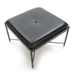 Julian Black Leather Stool with a square cushion, button tufting, and a sleek black metal frame.