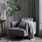 Hampton Grey Large Armchair with sleek grey fabric and oversized comfort. Shop now at www.louisandhenry.co.uk.