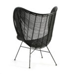 ROCHFORD Black Rattan Wingback Chair with natural rattan seat and black metal frame.