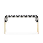 Belgravia Stripe Console Table with black and white stripes, gold legs, and modern bold design.