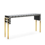 Belgravia Stripe Console Table with black and white stripes, gold legs, and modern bold design.