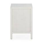 Haris White Cedar Wood and Rattan Bedside Table featuring a clean white finish with a unique rattan drawer design.