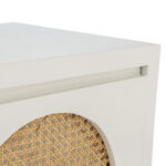 Haris White Cedar Wood and Rattan Bedside Table featuring a clean white finish with a unique rattan drawer design.