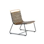 HAWTHORNE Wicker Chair with a natural and black woven wicker seat and black metal sled base, perfect for mid-century modern or bohemian decor. Shop now at Louis & Henry