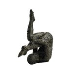 DALI Abstract Bronze Yoga Sculpture featuring a suspended male figure in a textured geometric design, stained in brown patina.