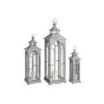 Set of Three Wooden Lanterns With Archway Design, ideal for enhancing hallway decor. Shop now at www.louisandhenry.co.uk.