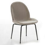 MEROS Beige Velvet Dining Chair with black metal legs and contoured seat.