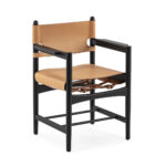 TALIA Dining Chair with tan leather upholstery and black wood frame, featuring a strap and buckle design.