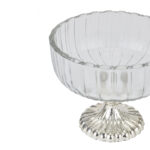 Small fluted glass display bowl with mercury-finished base, ideal for home decor accents.