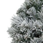 Snowy pine wreath with lifelike frosted branches for a holiday display.