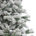 Large snowy pine tree with frosted branches, ideal for holiday decor.