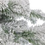 Large snowy pine tree with frosted branches, ideal for holiday decor.