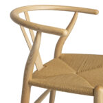 JESSA Dining Chair with a natural wood frame and handwoven rope seat, showcasing rustic elegance.