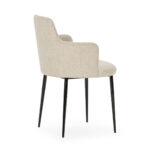 HARLEY Dining Chair with black metal frame and cream/beige fabric upholstery.