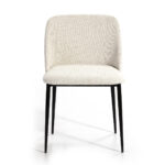 ARIS Dining Chair in cream upholstery with black metal legs and a curved backrest.