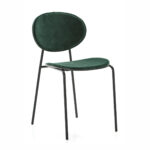 Zephyr Emerald Green Velvet Dining Chair with sleek black metal frame and ergonomic design.