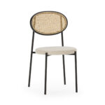 ROCHER Rattan Dining Chair with beige fabric upholstery and black metal frame, featuring a rattan cane backrest.