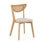 LEXY Natural Rattan and Wood Dining Chair with light wood frame, rattan backrest, and beige fabric seat.