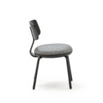 AUSTEN Chair in Black and Grey with a wooden backrest, light gray fabric seat, and black metal legs – modern and minimalist design.